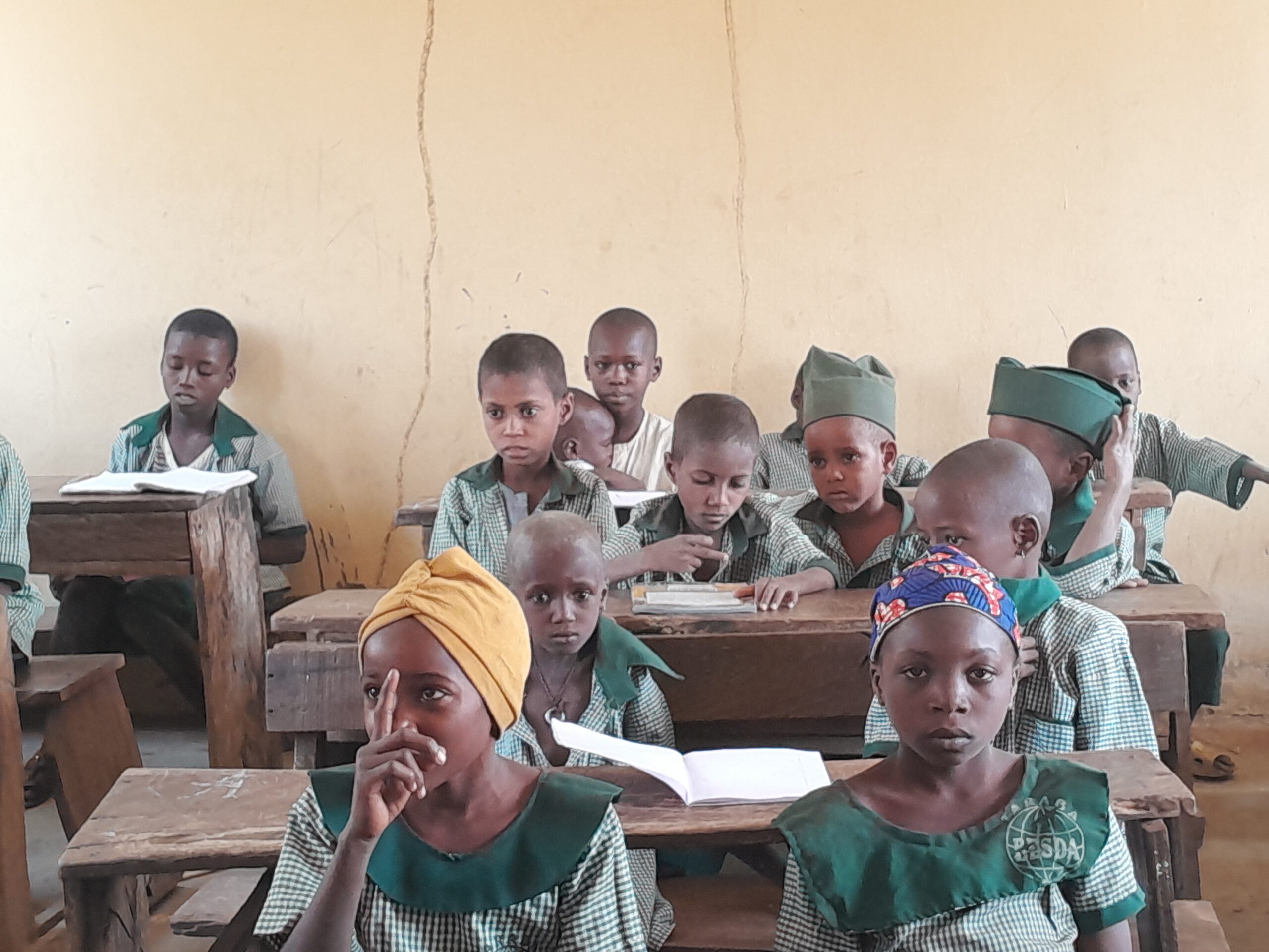 On a Monday morning in January 2024, Fulani children enrolled at the Garin Buba Community Primary School sits attentively in the class. Photo Yahuza Bawage.