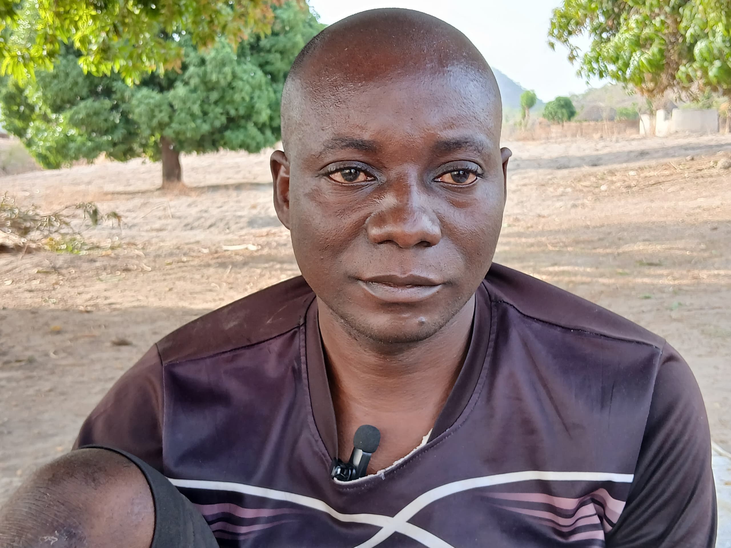 Martin Markus wasn't feeling well when this reporter visited. But his desperation to see the road construction gets to completion gave him the energy to speak. Photo Yahuza Bawage.