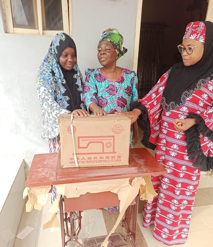 Pious Muslim Women Organization distributing a sewing machine to a widow: Photo Credit: Pious Muslim Women Organization