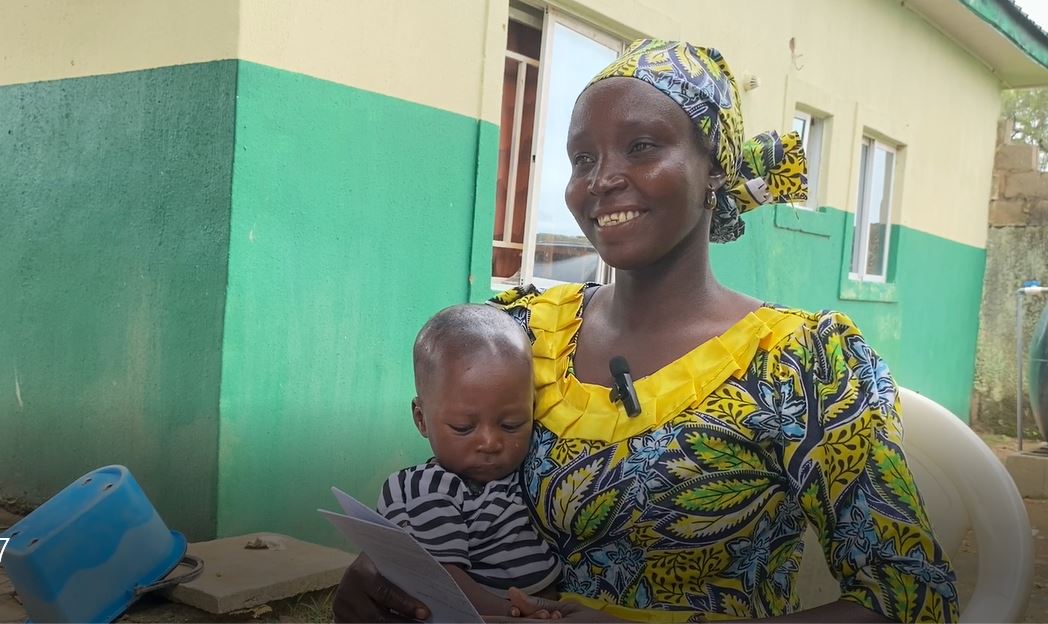 Talatu Danjuma, with her baby she brought for immunization. Photo Credit: Ogar Monday/Prime Progress