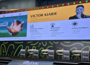 Victor Kiarie's name displayed on a screen at the Kenya Innovation Week in Nairobi, Kenya, November 2024. Photo Courtesy: Victor Kiarie