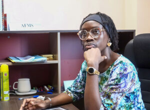 Alice_Djiba_the_voice_redefining_women_s_place_in_the_media_8 (1) Rosalie Ndiaye, President of AFMS, working in her office on September 25, 2025, in Dakar, Senegal. Photo: Penda Thiam, bird Story Agency