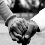 Black Couple Holding Hands