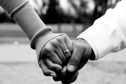 Black Couple Holding Hands