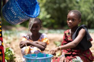 girls getting water