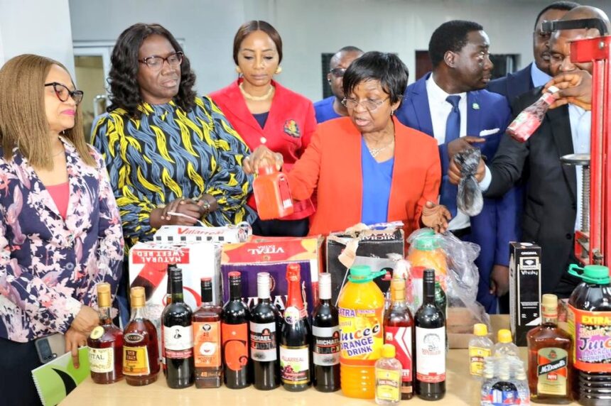 NAFDAC DG displaying a sample of adulterated drinks. Photo credit: Twitter