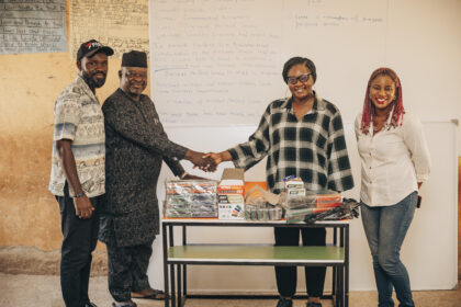 Donation of desk and teaching aids. Photo credit: FIST Africa