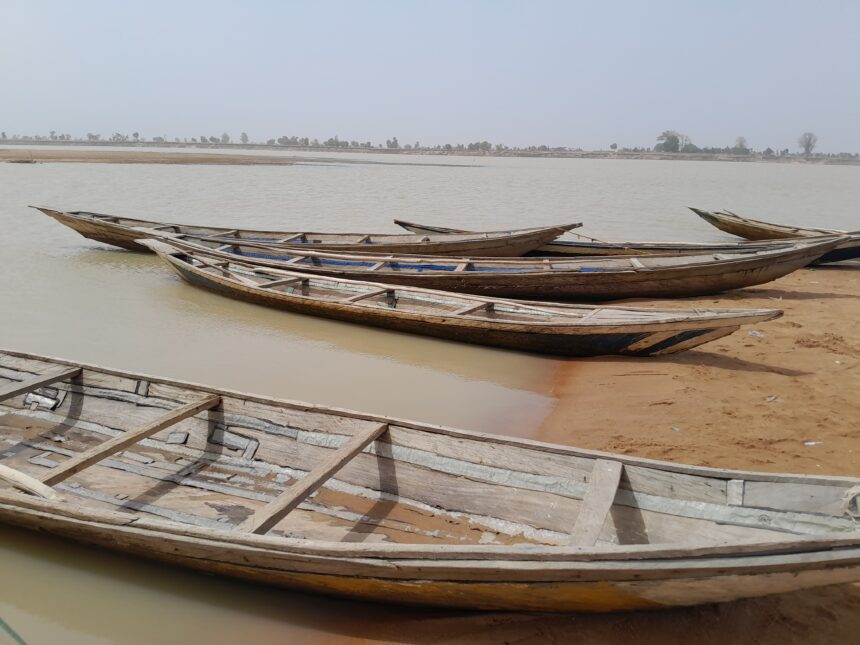 Traditional canoes used by Gambo and his colleagues to ferry passengers and goods. Photo Credit Yahuza Bawage for Prime Progress.
