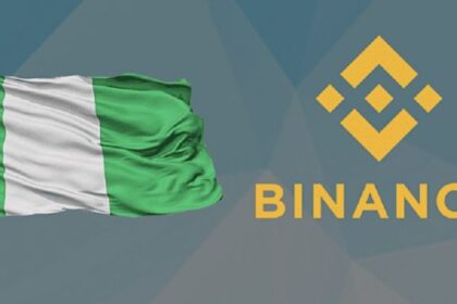 A Nigerian flag and Binance's mascot