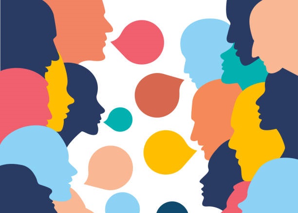 People profile heads in dialogue. Photo credit: Shutterstock