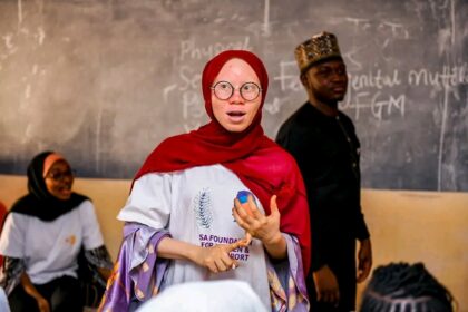 Adama Lami Yusuf speaks to school girls during an outreach program in Niger state. Photo credit: Salma Attah Foundation for Women and Girls Support.