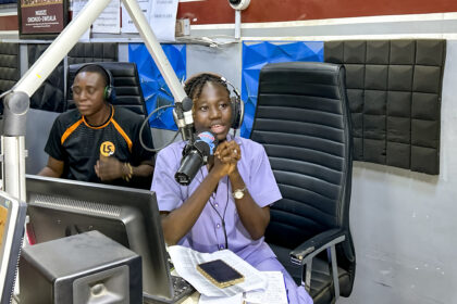 Aderonke Adesola, a Yoruba language radio presenter, during her live show, Jawonsi, on Splash FM in Ibadan, Nigeria. Photo credit: Zaniel Dada