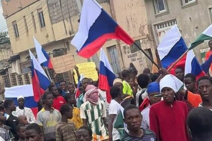 Protesters waving Russian flags at the recent Hunger protests in Nigeria. Photo credit: Nairametrics