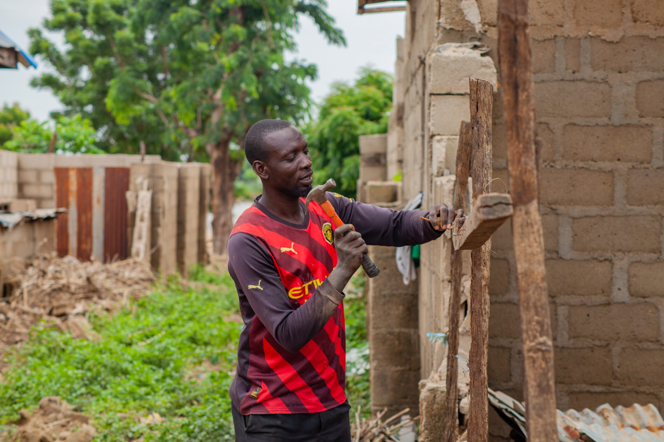 Nuhu Abdullahi said he would not rest until he and his siblings rebuilt their home. Photo credit: Ahmed Abubakar Bature.