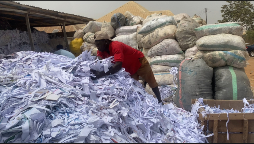 Workers at the facility gathering old papers for recycling