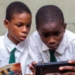 Students participate in an AI after school program in Edo Nigeria