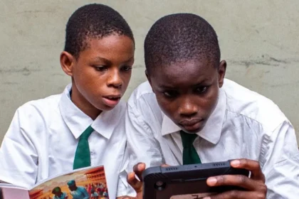 Students participate in an AI after school program in Edo Nigeria