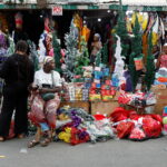 People shop for Christmas decorations in a market in Lagos. Photo credit: Temilade Adelaja