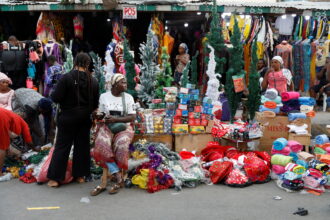 People shop for Christmas decorations in a market in Lagos. Photo credit: Temilade Adelaja