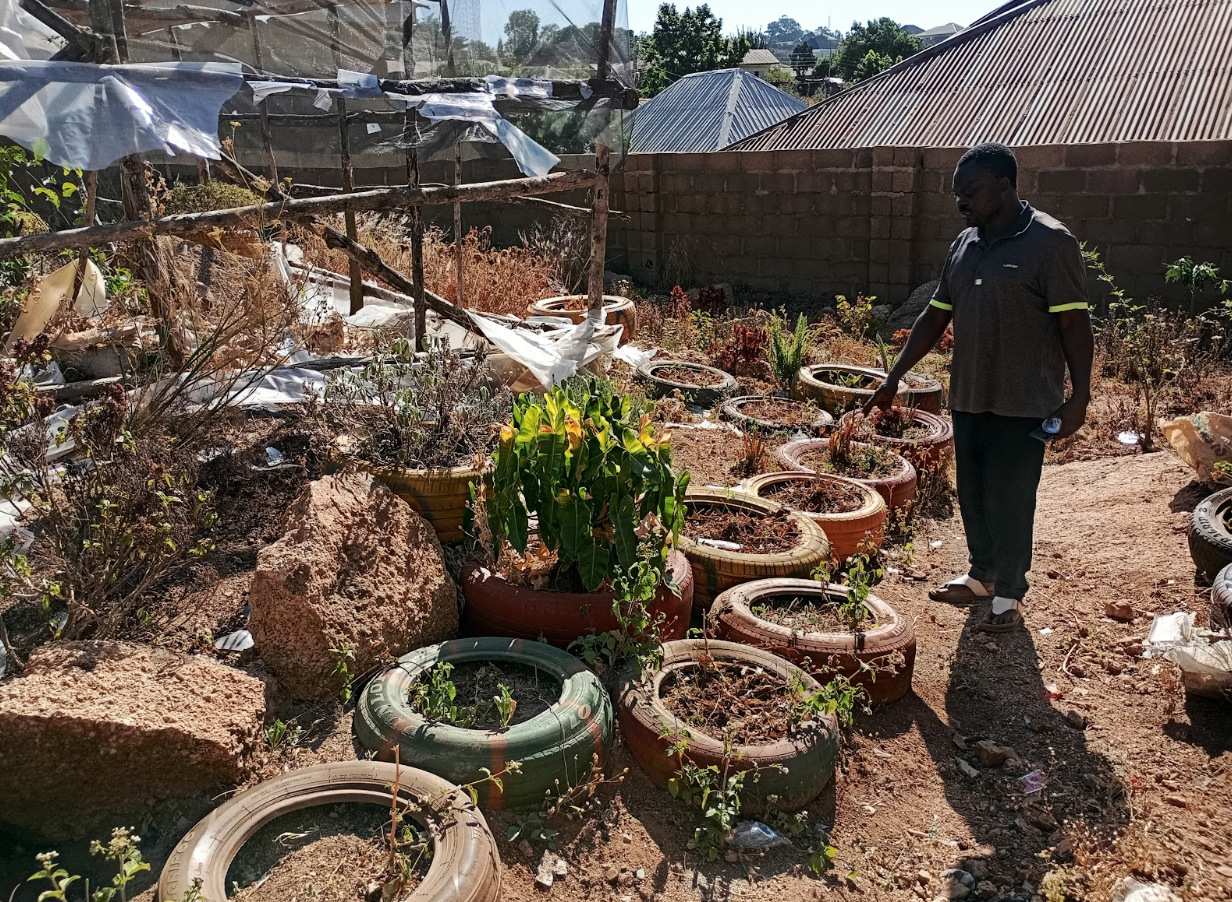 John in Gwarandok Community Garden. Photo credit: Nanji Nandang/Prime Progress