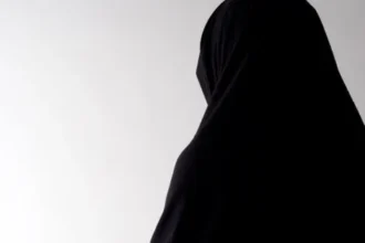 A widow in black clothing