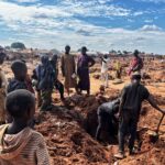 Neighbors gather as a victim tries to dig out a buried piece of future. Photo taken in Mokwa, Niger State, Nigeria, on 5th June, 2025. Photo credit: Ogar Monday