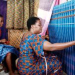 A Nigerian woman and her son weave the Akwete fabric. Credit: Pinterest