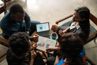 Focused group of young African businesspeople