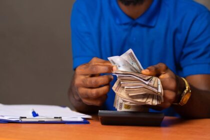 Nigerian man counting money