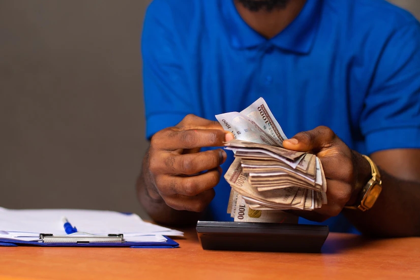 Nigerian man counting money