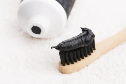toothbrush black charcoal toothpaste 167463664