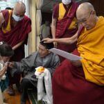This image is used to illustrate The Rowell Fund for Tibet communities. The photo shows Tibetan ex-political prisoner Dhondup Wangchen and his family had the audience of a lifetime with His Holiness the Dalai Lama.