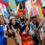 Flagbearers at One Young World's Belfast summit. Photograph: One Young World