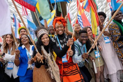 Flagbearers at One Young World's Belfast summit. Photograph: One Young World