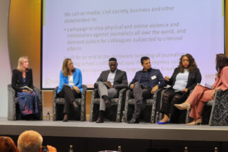 Dr Yemisi Akinbobola, award-winning journalist, academic, consultant and co-founder of African Women in Media (AWiM) in a panel during a Conference. Photograph: Courtesy of AWIM