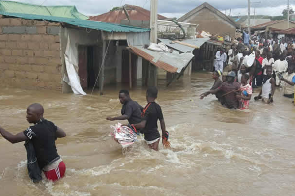 Hapless residents in the wake of the Mokwa floods. Photo credit: TVC News