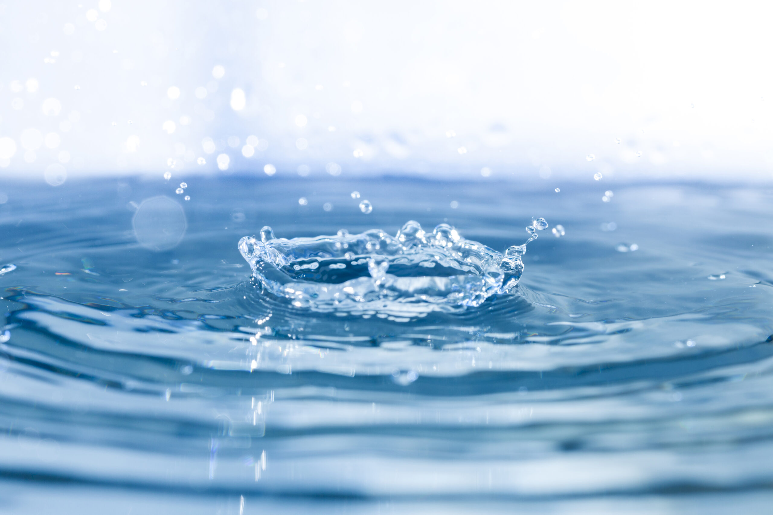 A water surface with splashes. Credit: Web image