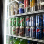 Cans of soda are displayed in a case at Kwik Stops Liquor in San Diego. Credit: Sam Hodgson/Reuters