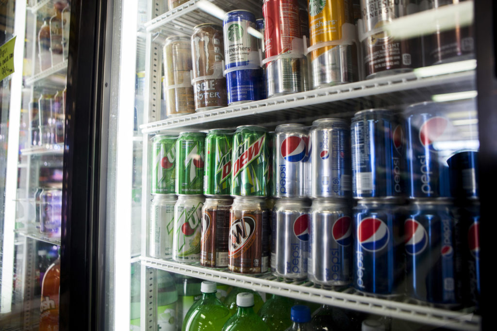 Cans of soda are displayed in a case at Kwik Stops Liquor in San Diego. Credit: Sam Hodgson/Reuters