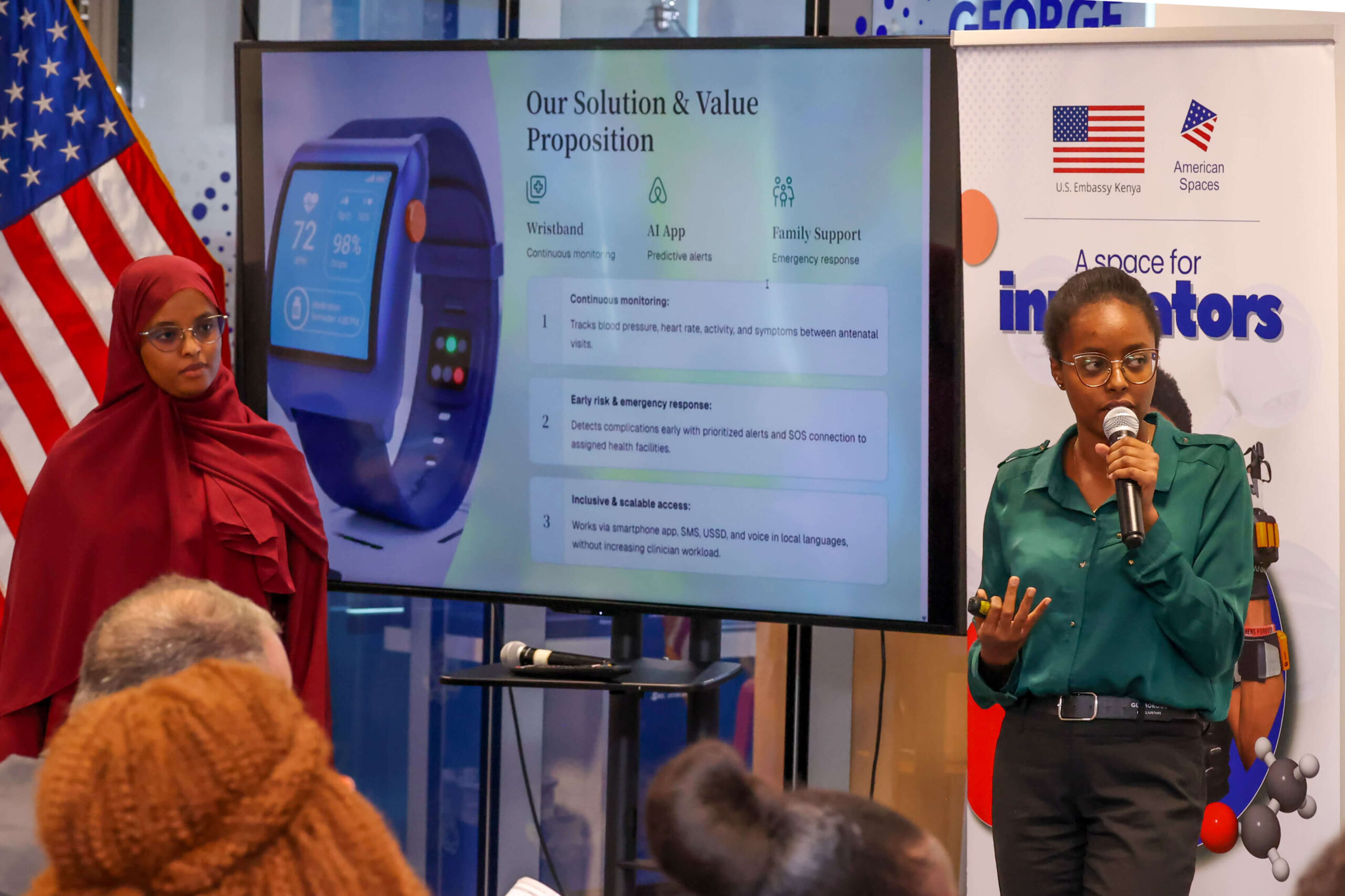 Pregnancy rist warning. Photo credit: Medibora team members Jael Wainaina (holding the microphone) and Fardosa Mohamed make presentation about their project during the hackathon's awarding ceremony. Photo courtesy: Medibora