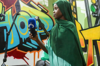 Aïssatou Camara , communication manager at InfoElles and Director General of ONE NATION TV, in the studio as they prepare for "The Morning Nation" broadcast on September 26, 2025, in Dakar, Sene gal. Photo: Penda Thiam, bird Story Agency
